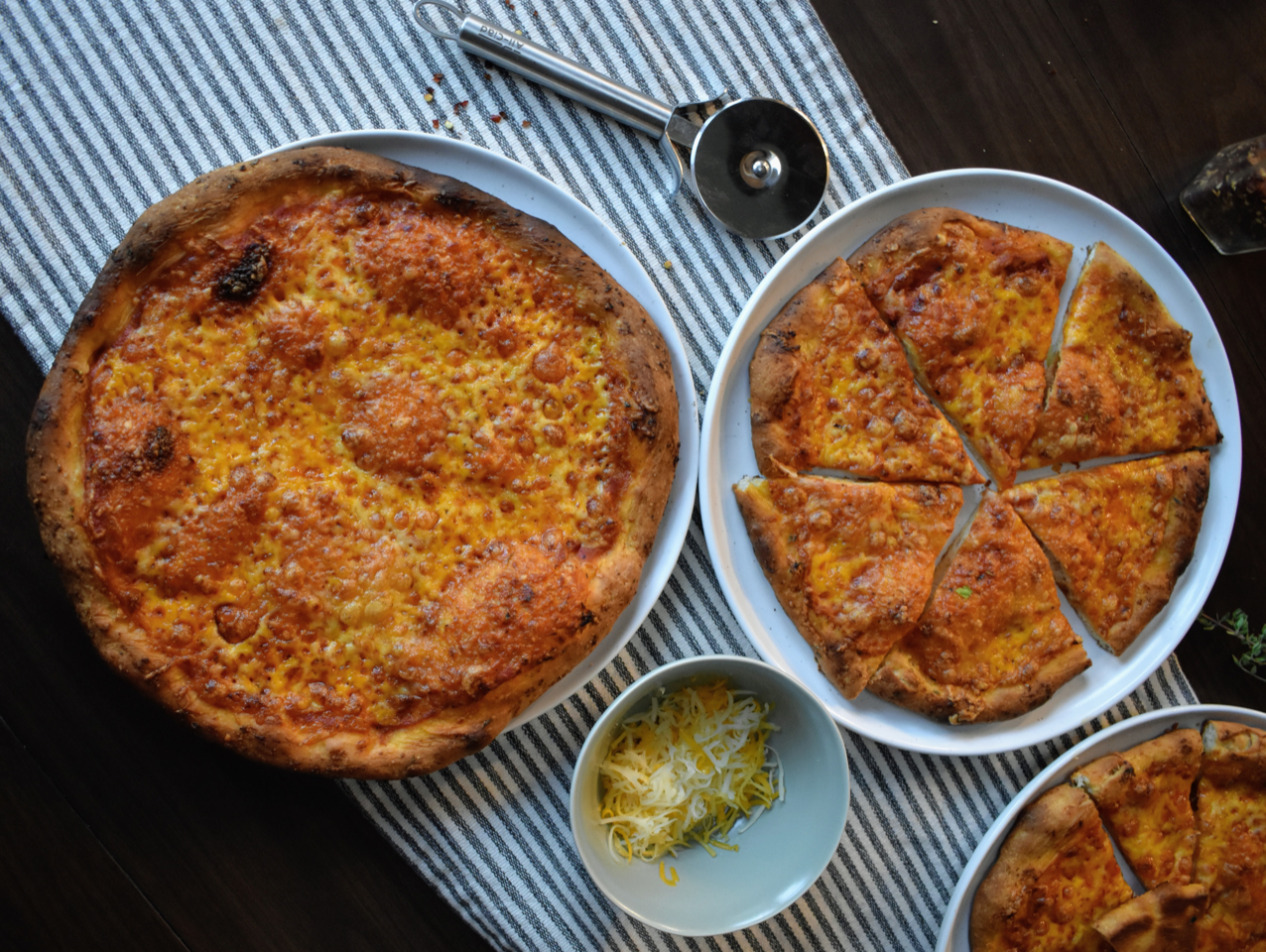 Four-Cheese Pizza with Tomato Sauce and Garlic Herb Crust – The Creamery