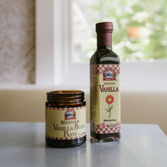 A bottle of Blue Cattle Mexican Vanilla Extract and jar of Mexican Vanilla Bean Paste from The Creamery 