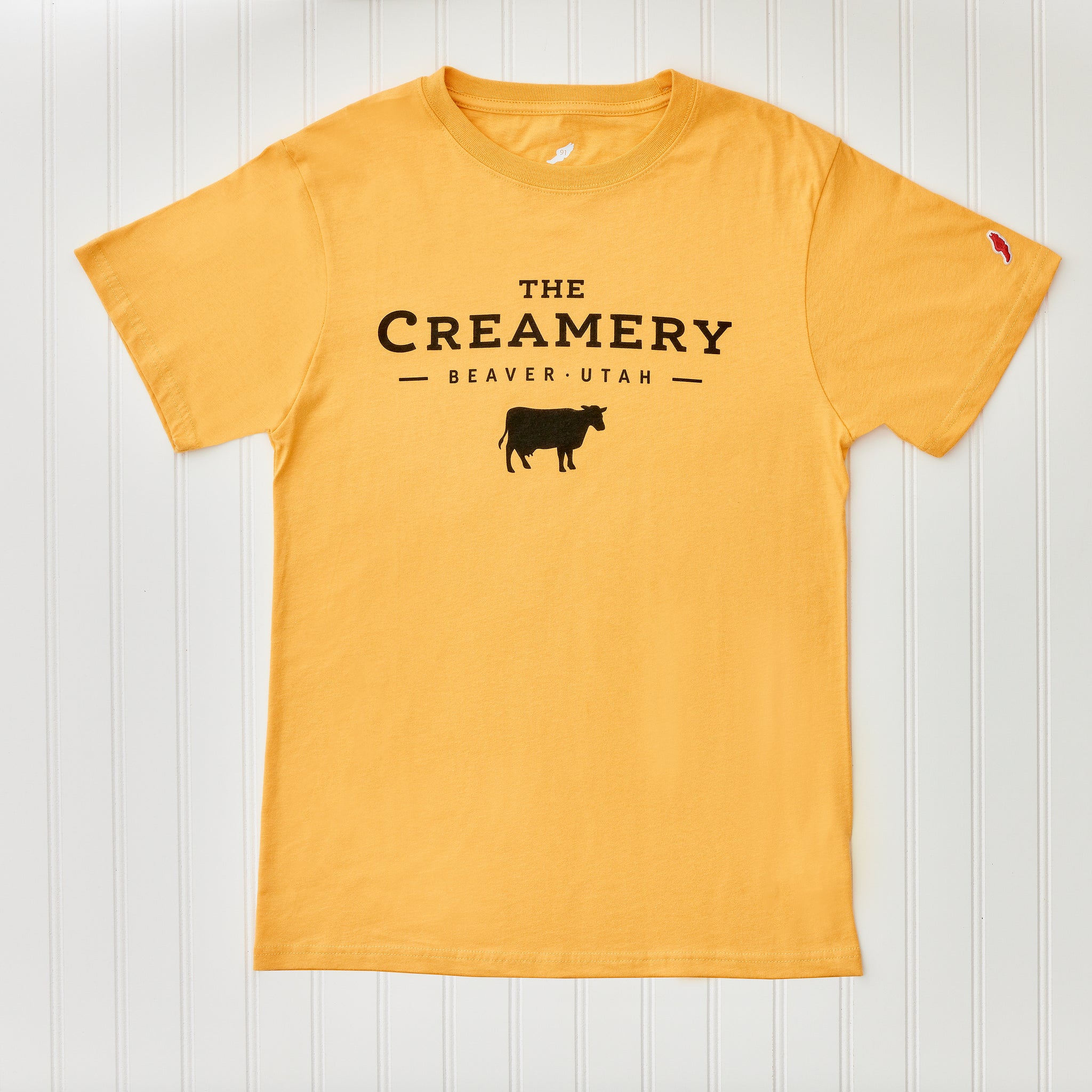 The Creamery All-American Varsity Gold Tee